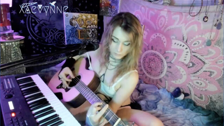 Xaevynne Serenades With Her Guitar